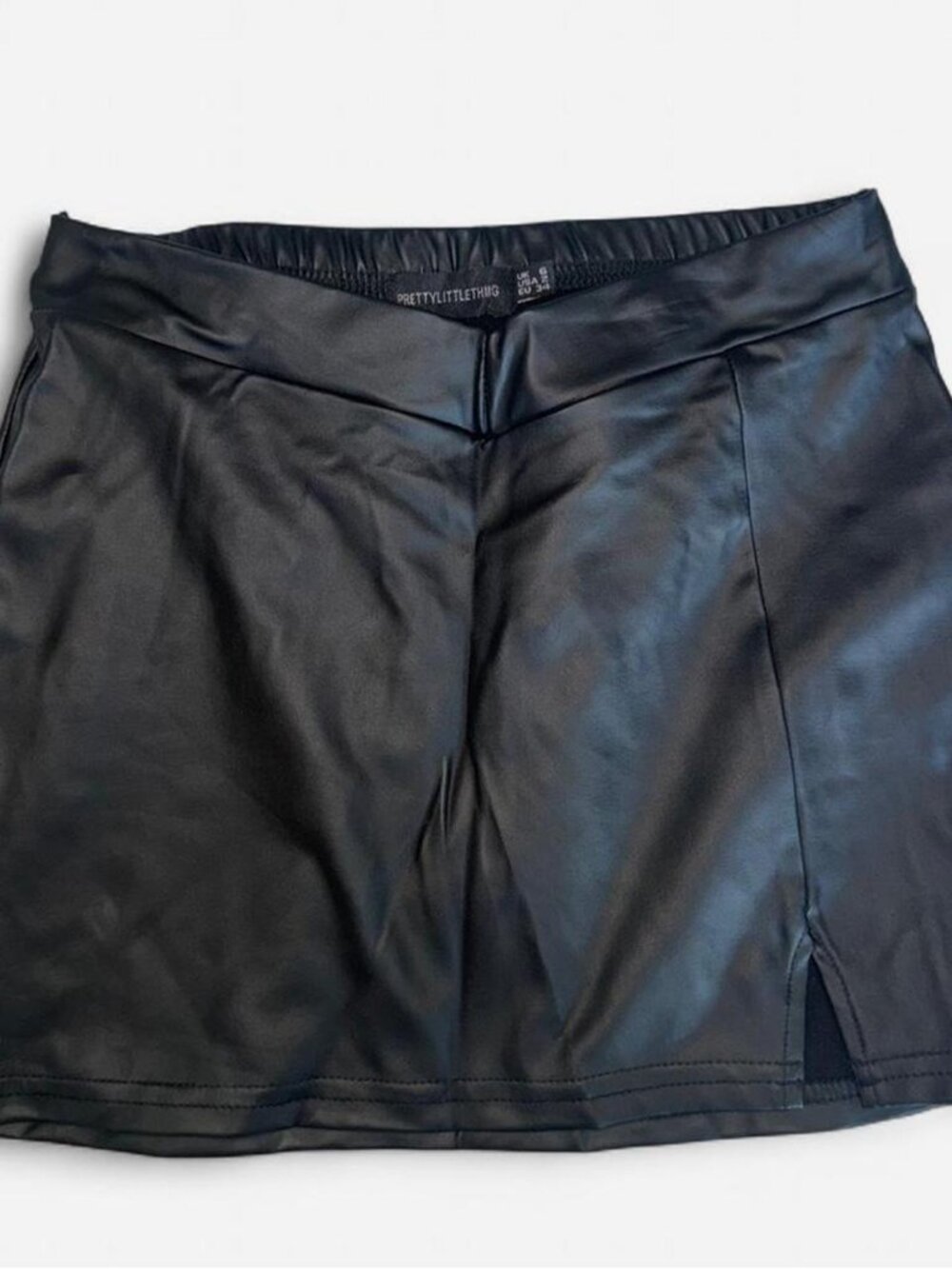 PrettyLittleThing black faux leather mini skirt
